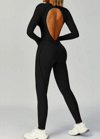 Женский спортивный сплошной комбинезон, декорированный швами с длинным рукавом и открытой спинкой. Strunka комбинезон-брюки однотонный чёрный спортивный