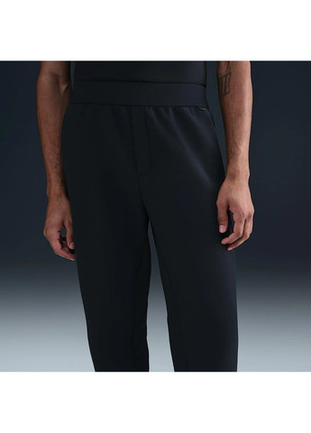 Черные демисезонные брюки Nike