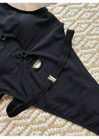 Чорний літній жіночий суцільний купальник з вирізами / жіночий монокіні з декоративними отворами чорний / жіночий купальник No Brand