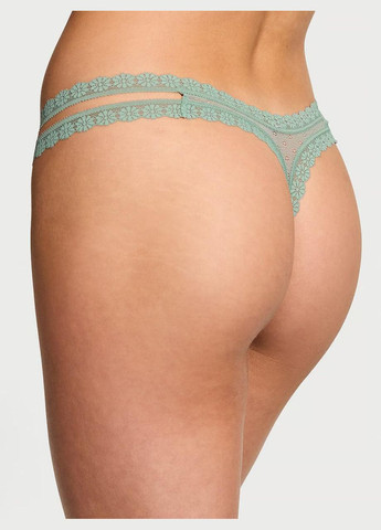 Трусики-стрінги жіночі мереживні Daisy Lace Thong Panty зелені Victoria's Secret (330752174)