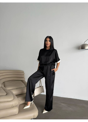 Жіночий костюм з легкої струмкої тканини Україна (358644021)