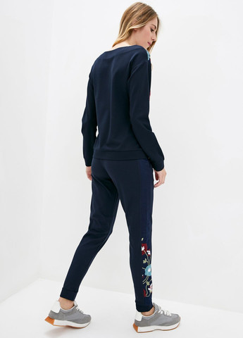 Жіночий спортивний костюм темного синього кольору з вишивкою ORA (282737180)