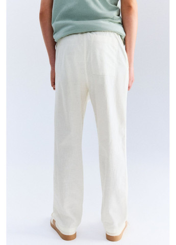 Белые демисезонные брюки H&M