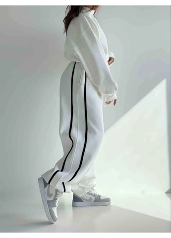 Жіночі об'ємні зимові штани з лампасами Nositi 1891-13Х (369971289)