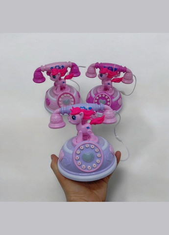 Телефон музичний на батарейках (малиновий) MIC (322653951)