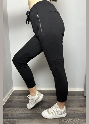 Жіночі штани трикотажні завужені чорні MKKC310823-1 Modna KAZKA (272816072)