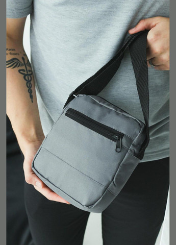 Барсетка N**e серая маленькая, белое лого регулируемая длина ремешка. No Brand (343315734)