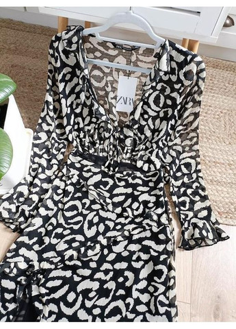 Чорна гарна сукня міді з вирізом на талії. Zara