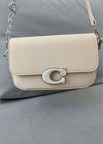 Кремова жіноча сумка з декоративною пряжкою та змінними ремінцями InFashion Сумка (342112315)