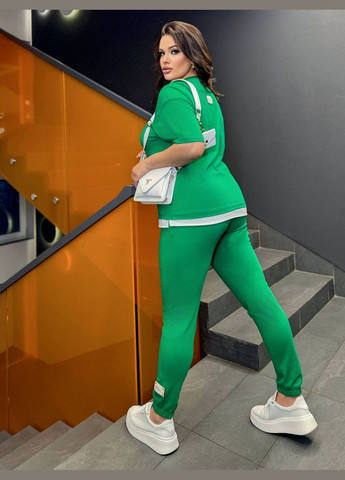 Жіночий костюм-двійка колір зелений р.50/52 454474 New Trend (290111608)