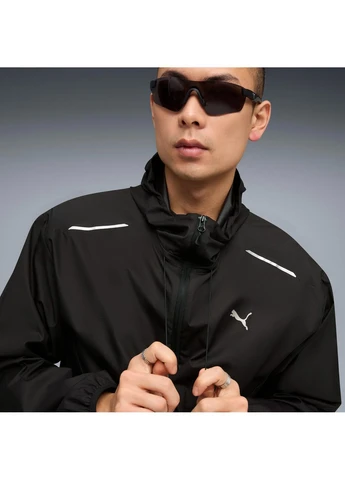 Чорна демісезонна куртка relaxed track black 634419-01 Puma