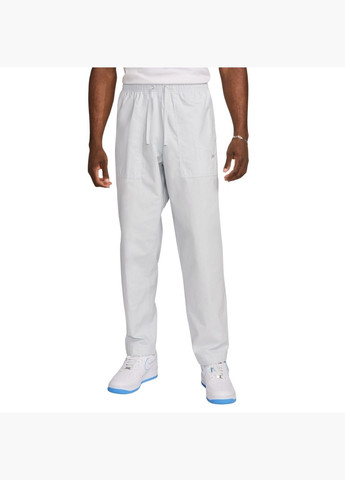 Белые демисезонные брюки Nike