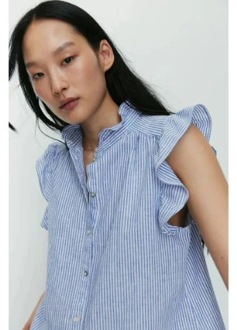 Блакитна блуза H&M