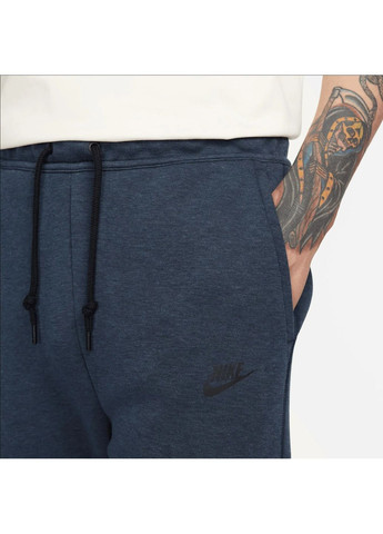 Синие демисезонные брюки Nike