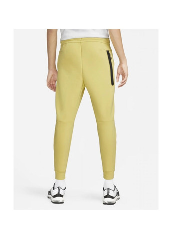 Желтые демисезонные брюки Nike