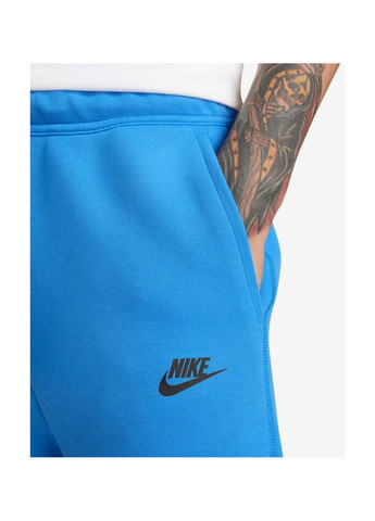 Голубые демисезонные брюки Nike