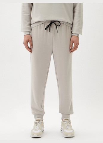 Серые брюки John Richmond