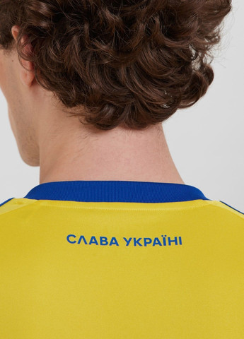 Желтый демисезонный спортивный лонгслив adidas с логотипом