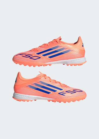 Помаранчеві літні бутси f50 league turf adidas