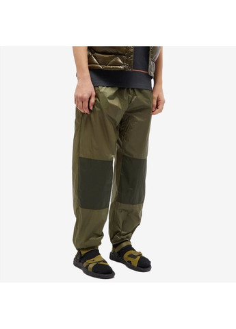 Оливковые демисезонные брюки Nike