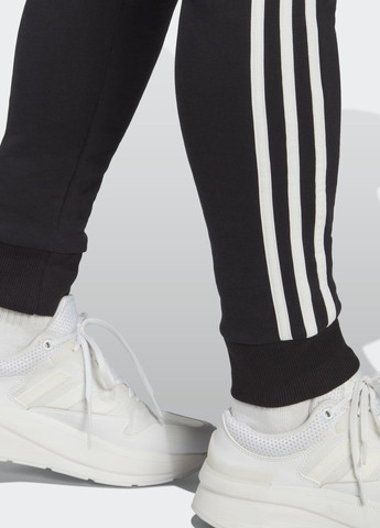 Штани Essentials 3-Stripes French Terry Cuffed adidas (259728651)