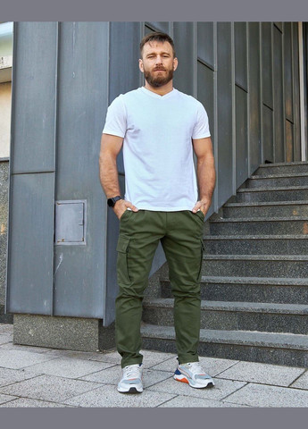 Зеленые демисезонные брюки Olymp