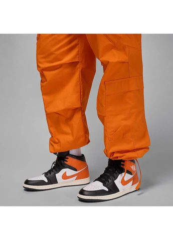 Оранжевые брюки Air Jordan