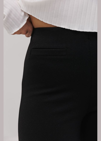 Жіночі штани-кльош чорні з розрізами внизу Arjen (289842095)