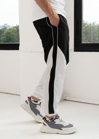 Спортивні штани чоловічі плащівка на манжетах No Brand (307151890)