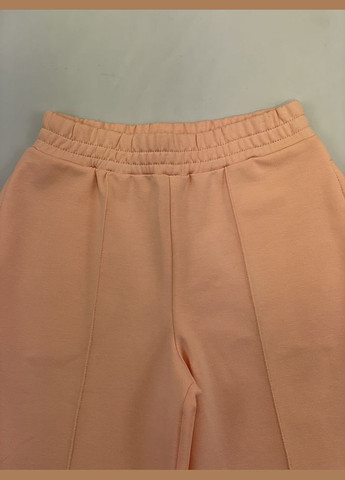 Персиковый демисезонный трикотажный костюм для девочки Mevis