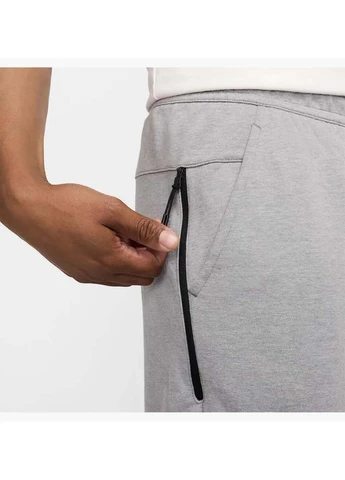 Серые спортивные демисезонные брюки Nike