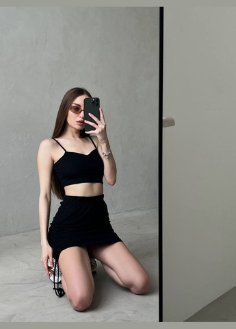 Жіночий костюм в рубчик топ та спідниця з затяжками MonCher (332615241)