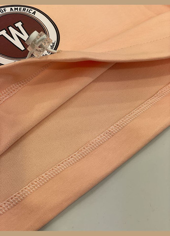 Персиковый демисезонный трикотажный костюм для девочки Mevis