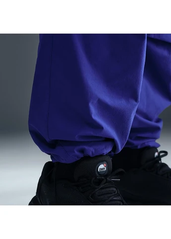 Синие брюки Nike