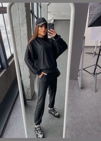 Базовый однотонный костюм-двойка чернрго цвета – стильный и комфортный выбор для повседневных образов No Brand 466-1 (317644908)