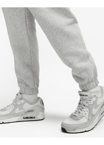 Серые демисезонные брюки Nike