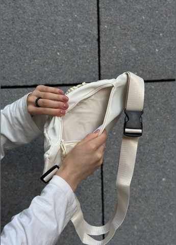 Бананка біла молочна 102 поясна сумка через плече No Brand (303606032)