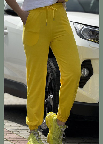 Спортивные штаны женские желтого цвета Let's Shop (292755142)