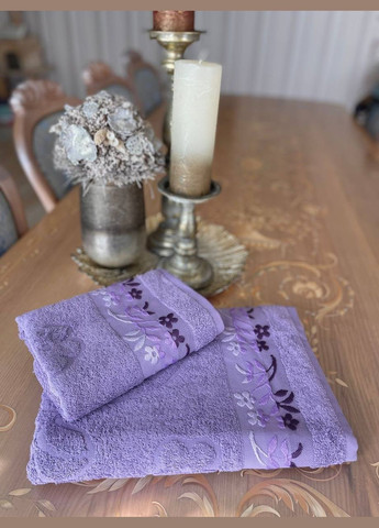 Катруся полотенце махровое 50х90 гладкокрашенное жаккардовое бордюр цветочная поляна однотонный фиолетовый производство - Украина