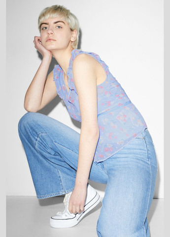 Блакитна блуза в квітковий принт C&A