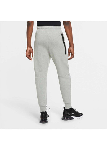 Серые демисезонные брюки Nike