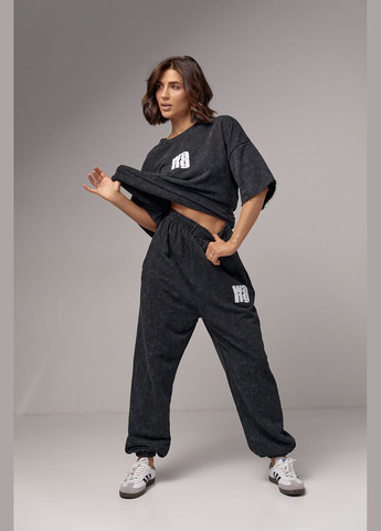 Жіночий спортивний костюм у техніці tie-dye - чорний Lurex (289060932)