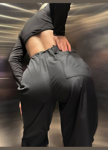 Классные широкие штаны из плащёвки у которых по бокам и сзади карманы, талия штанов карго на затяжках с фиксатором No Brand 166-1 (278676028)
