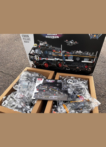 Конструктор SWAT corps Поліцейський спецтранспорт з дроном WOMA 1697 деталей No Brand (342369277)