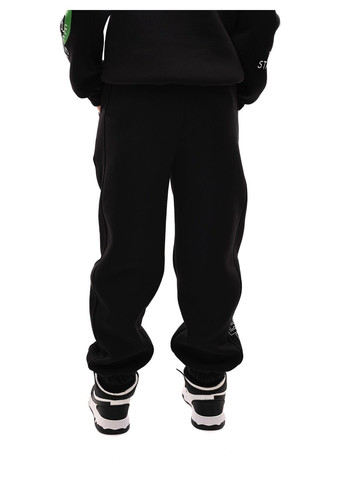 Черные зимние брюки Teya