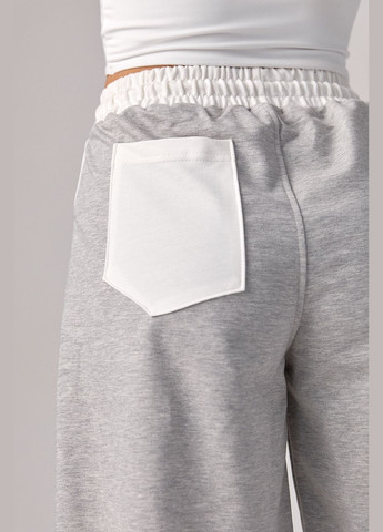 Жіночі трикотажні шорти з написом Nike - світло-сірий Lurex (293301477)
