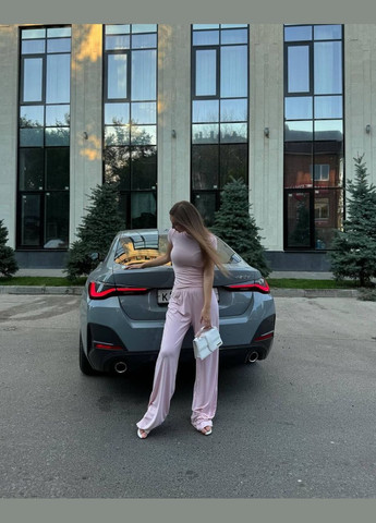 Жіночий костюм з топом та брюками Україна (327416190)