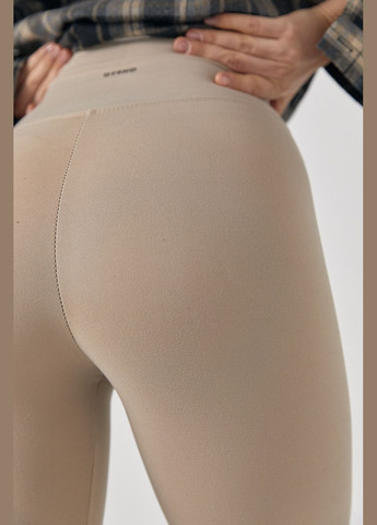 Бежевые демисезонные женские лосины oysho с утягивающим эффектом Lurex