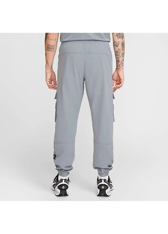 Серые демисезонные брюки Nike