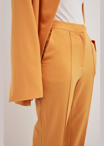 Оранжевые брюки NA-KD